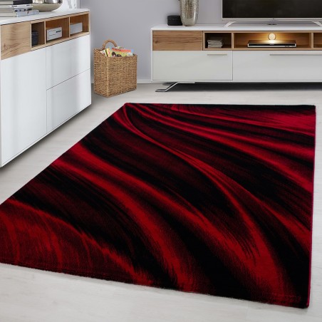 Tapis design moderne salon vagues abstraites optique noir rouge chiné