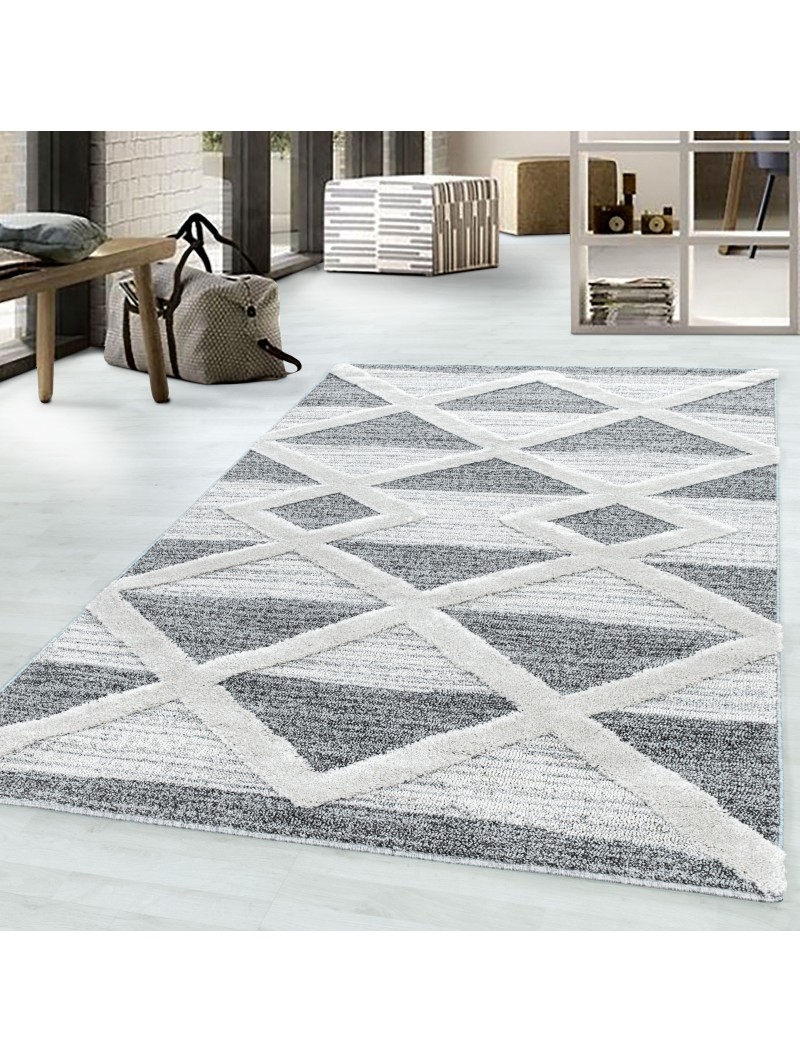 Short pile design carpet MIA Looped Flor 3-D cross pattern