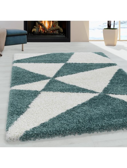 Woonkamer tapijt ontwerp hoogpolig tapijt patroon abstract driehoeken blauw